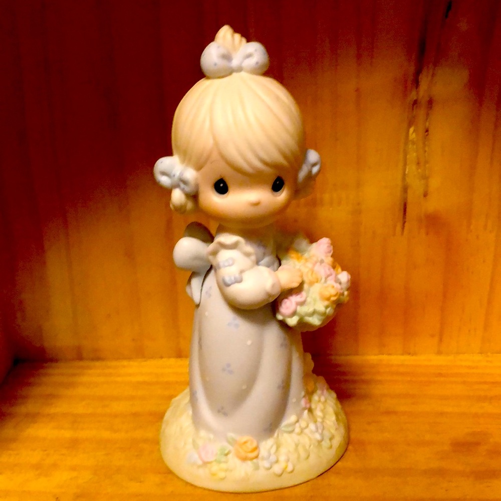 Precious Moments Take time to smell the flowers
